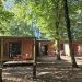 Cabins with private terraces at Huttopia Beaulieu-sur-Dordogne